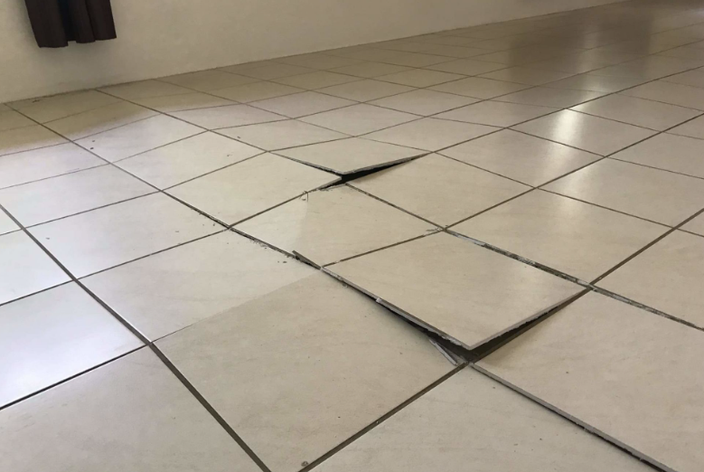 loose floor tiles repair